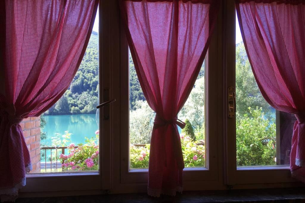 Casa A Schiera Fronte Lago Con Giardino Barcis Eksteriør bilde